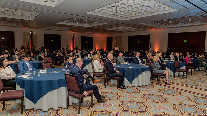 Attendees in the ballroom at the 2023 Forum