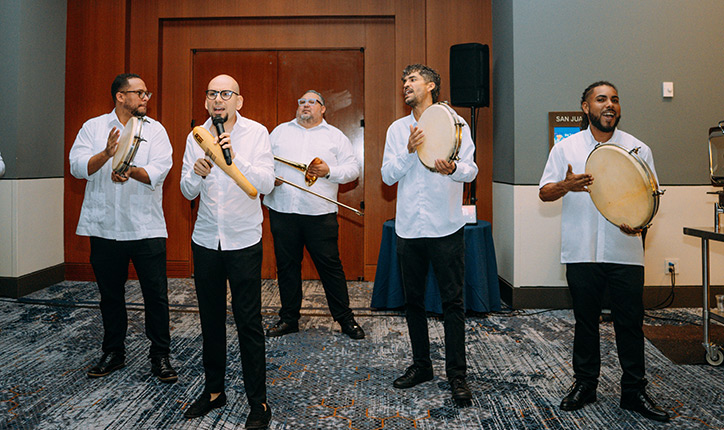 Traditional Puerto Rican musicians performing at the 2025 Forum
