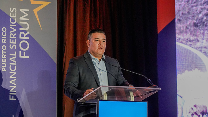 Presenter at the podium at the 2023 Forum