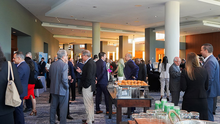 Attendees networking during a break at the 2023 Forum